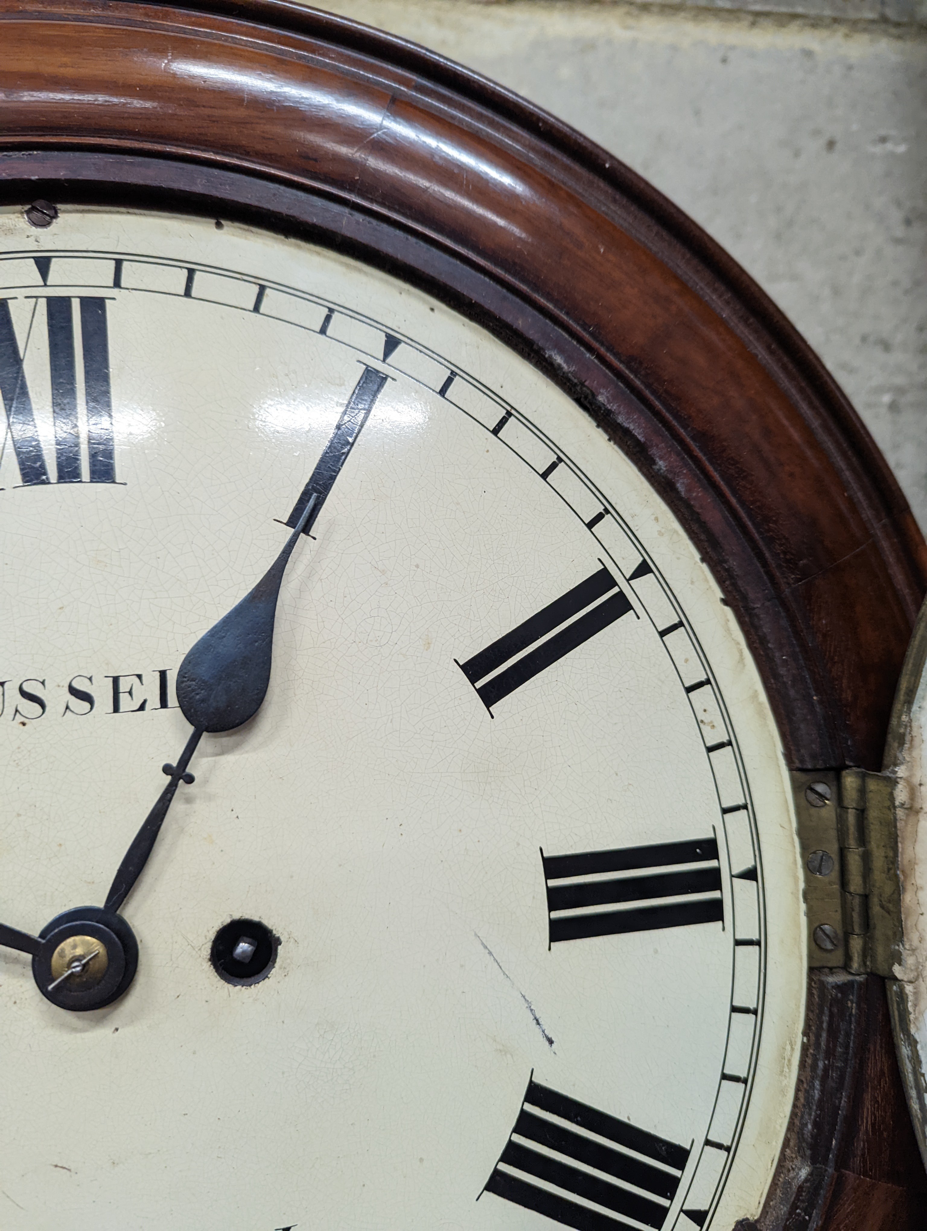 A Victorian mahogany drop dial wall clock, with twin fusee movement, and circular white painted Roman dial signed 